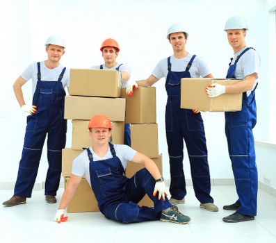 Removals team handling furniture during home moves in Balham