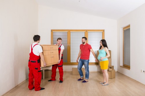 Loading boxes into a Balham moving van