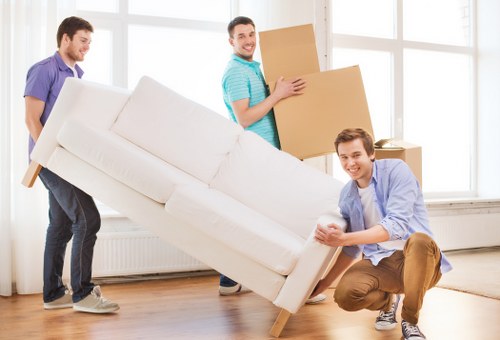 Professional movers loading furniture for a Balham relocation