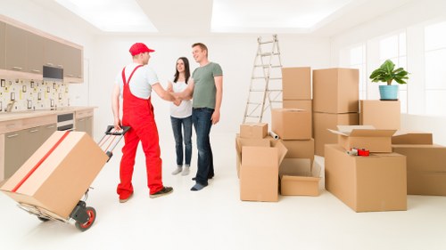 A trained man and van crew preparing for a move in Balham